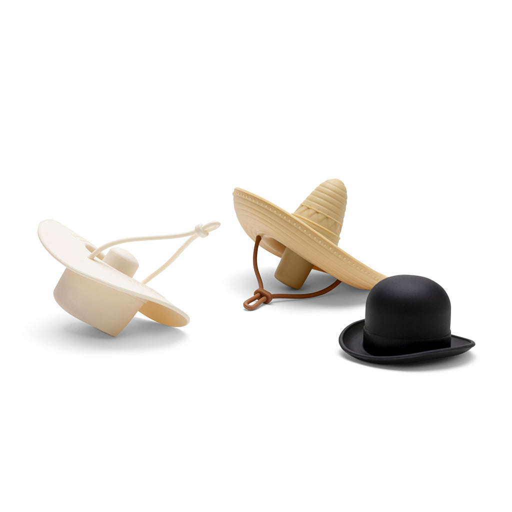 Reusable BPA-free silicone wine bottle stoppers with playful hat designs