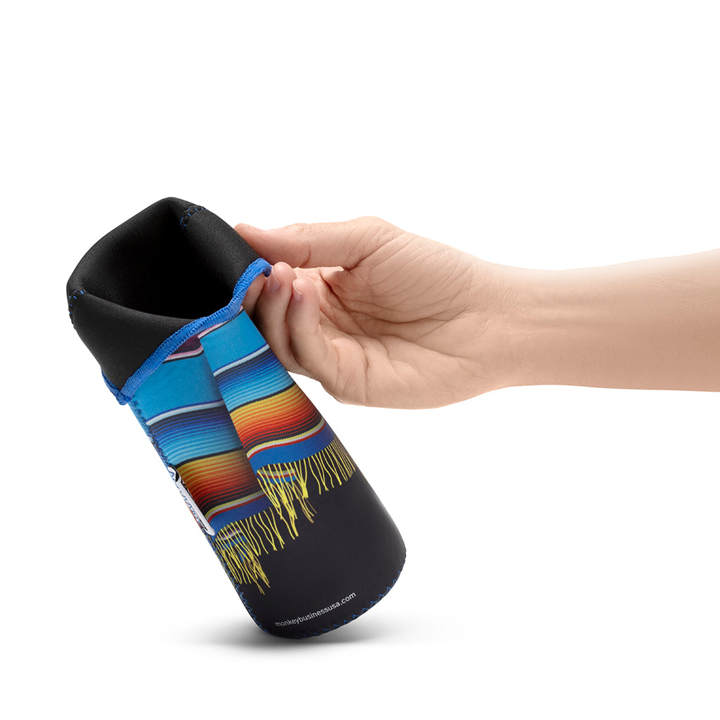 Two neoprene wine bottle sleeves in vibrant poncho designs, designed to keep wine chilled and add fun to any table.