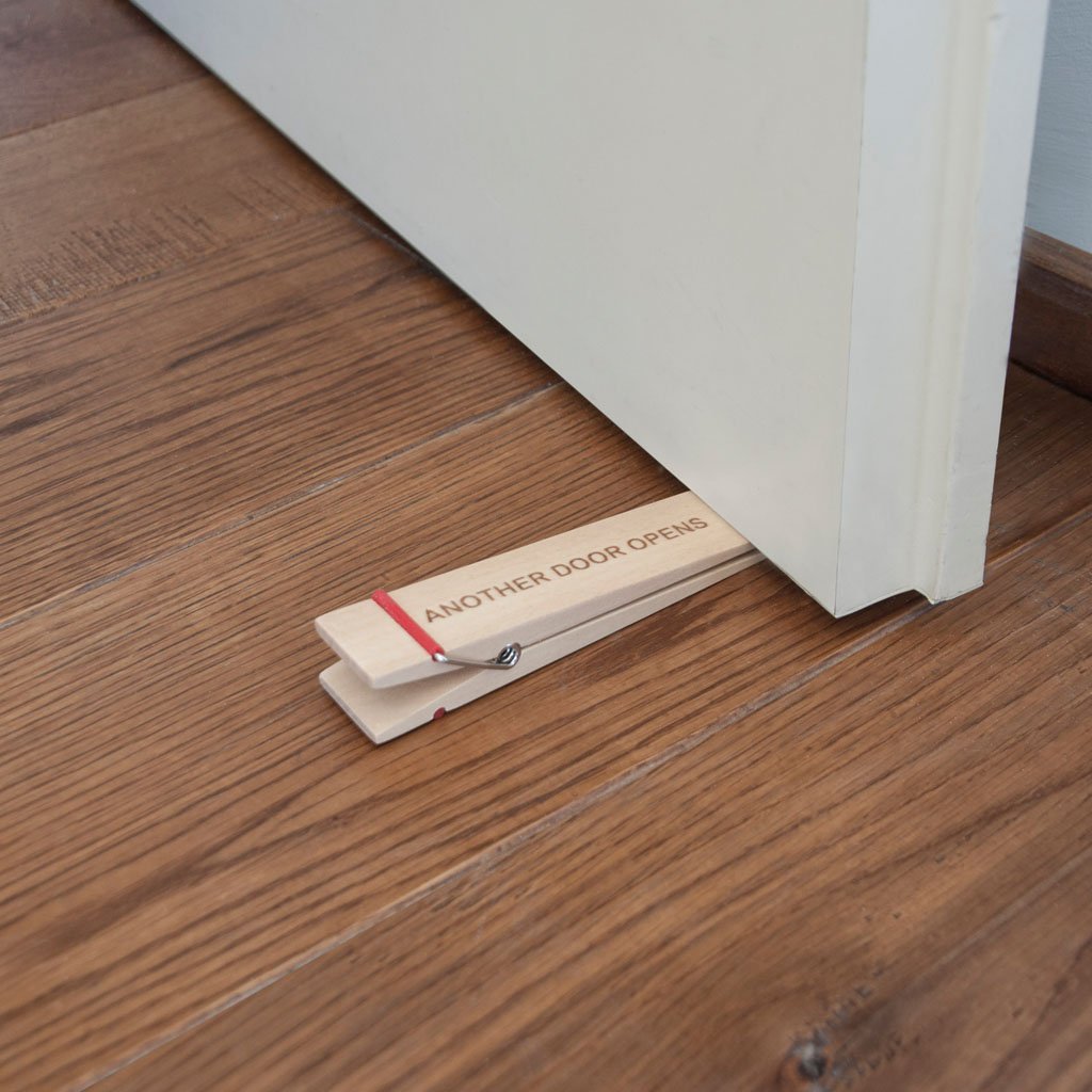 OPENING | Doorstopper with a message - - Monkey Business Europe