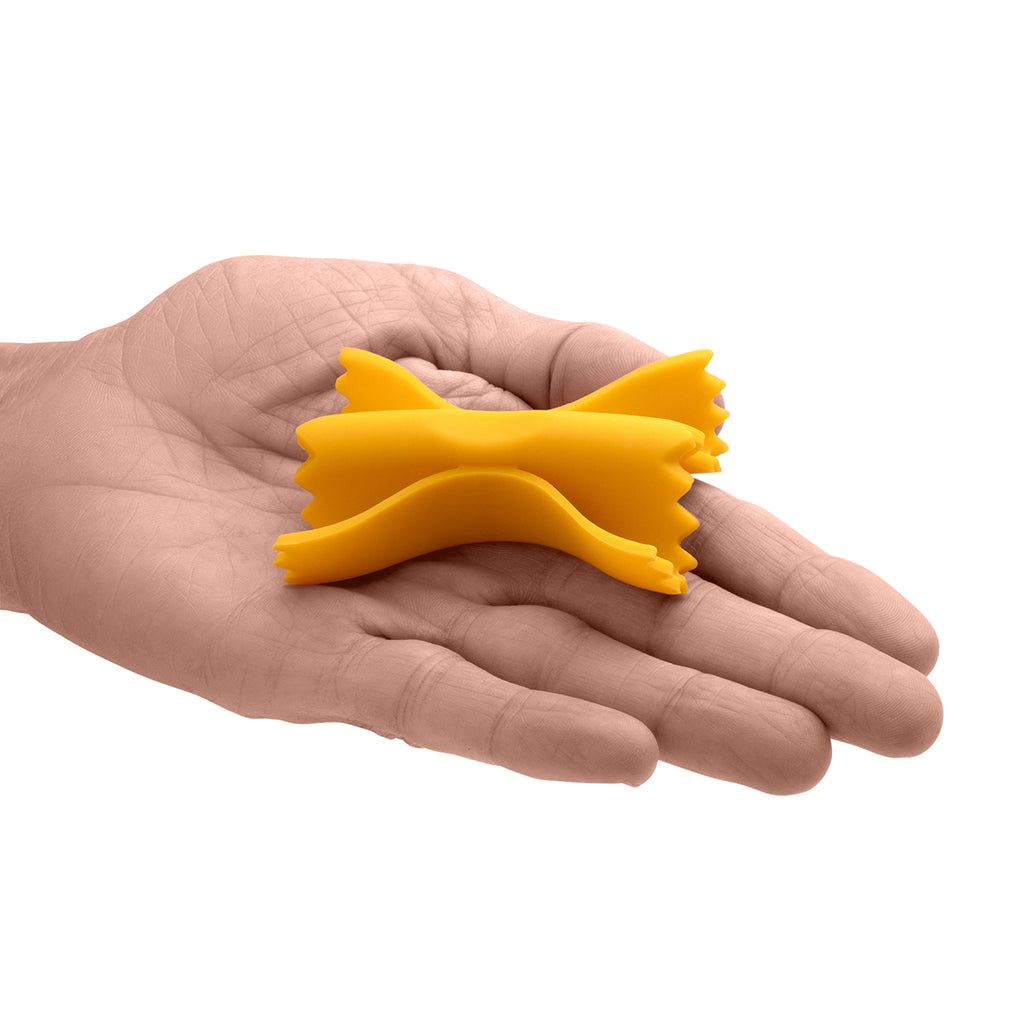 Farfalle silicone tool lifting pot lid with steam rising
by Monkey Business
