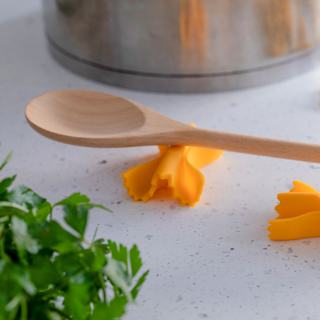 Farfalle lid lifter letting steam escape from pot
by Monkey Business