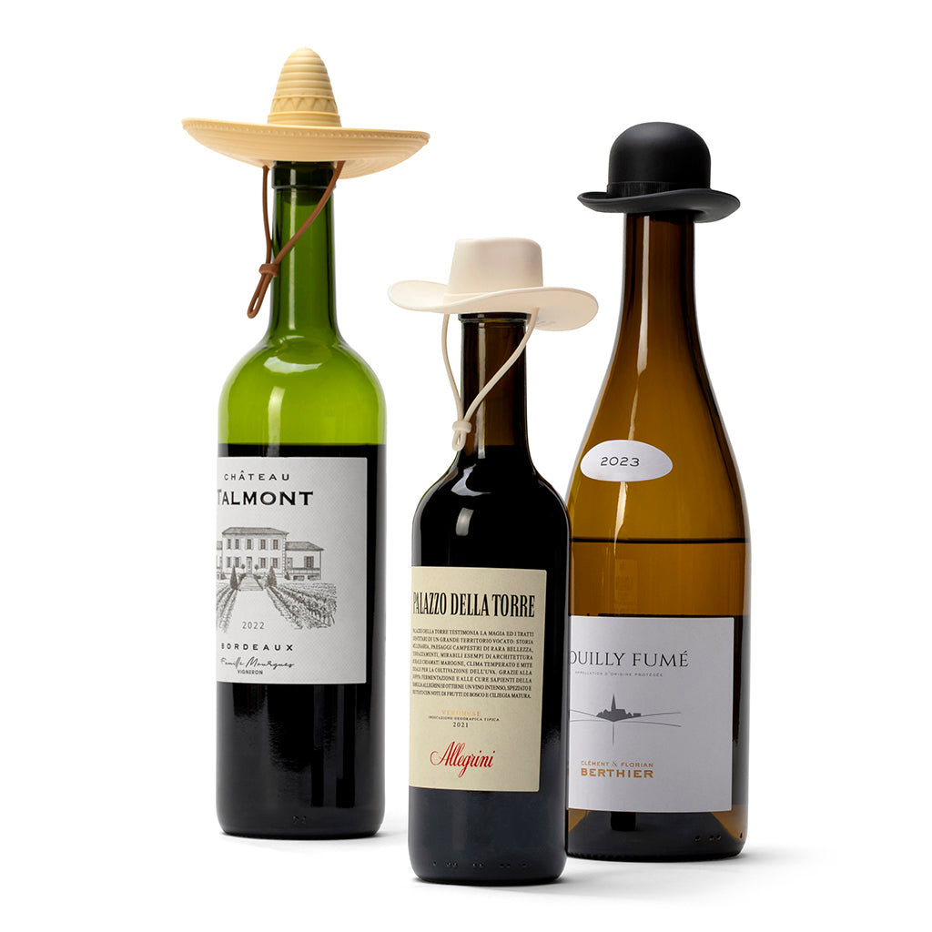 Wine bottle stopper gift set with three colorful silicone hat designs.
