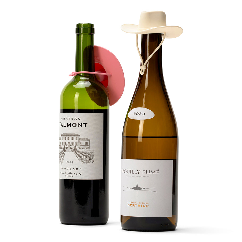 Cowgirl hat wine stoppers decorating wine bottles for parties and celebrations