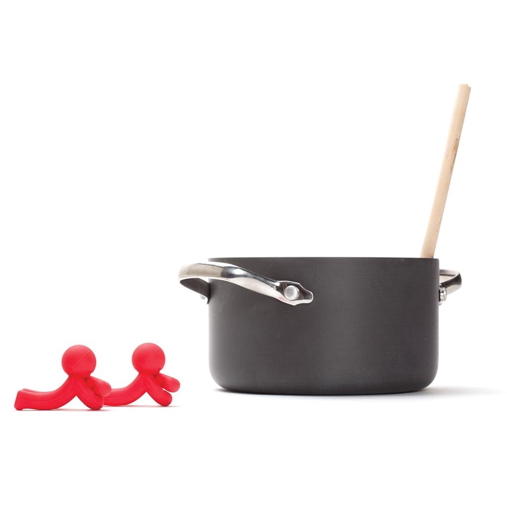 Kitchen utensil buddy keeping the spoon in place